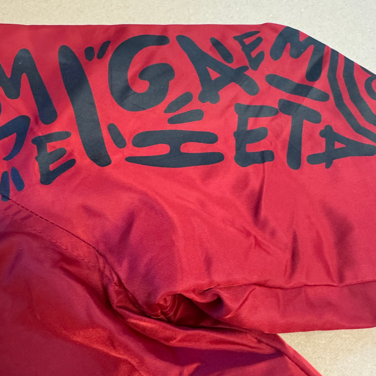 Evisu Alphabet red bomber raincoat – Close-up 3