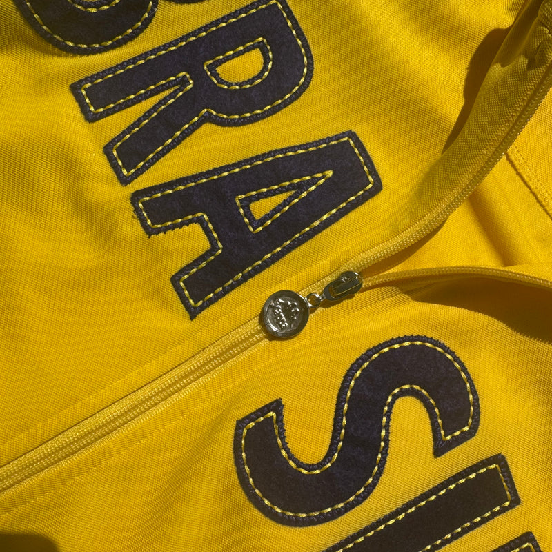 Detailansicht: Sourced limited accessories and clothes Kappa Brasil yellow streetwear track jacket – Logo, Nähte oder Material