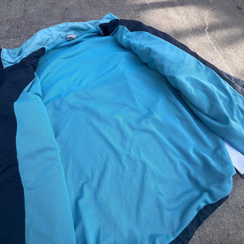 Detailansicht: Sourced limited accessories and clothes Nike vintage 90s blue retro track set – Logo, Nähte oder Material
