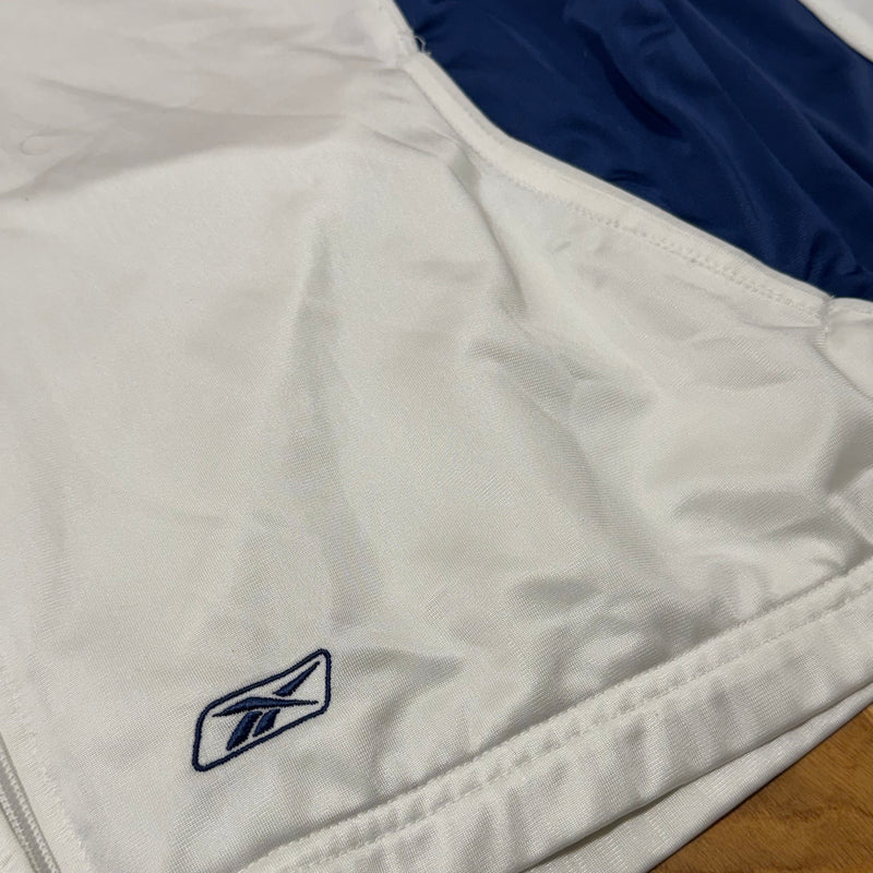 Detailansicht: Sourced limited accessories and clothes Reebok vintage white track jacket – Logo, Nähte oder Material