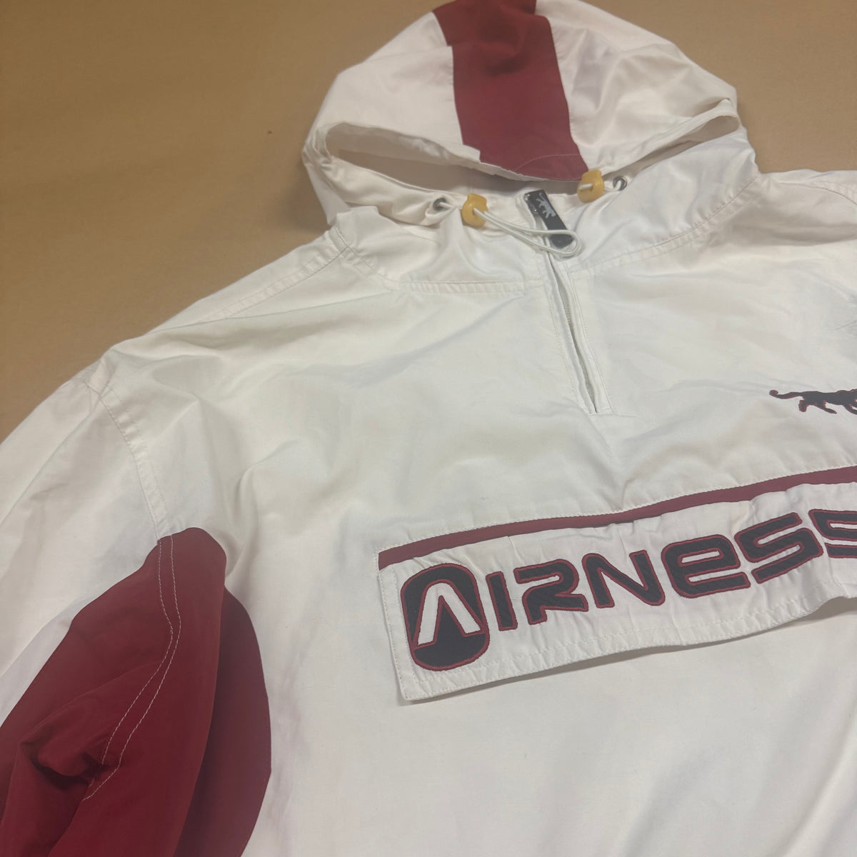 Streetwear style Airness raincoat with a hood – Close-up 2