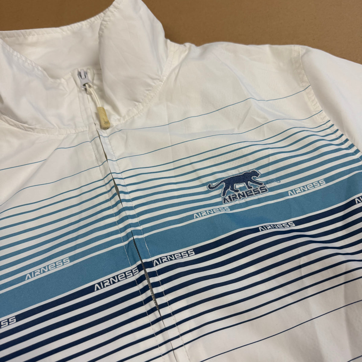 Streetwear style Airness white track jacket – Close-up 1