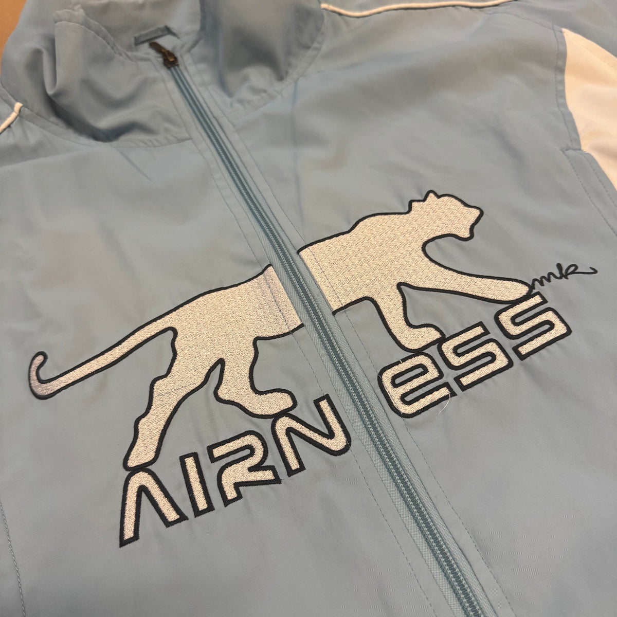 Streetwear style skyblue Airness track jacket – Close-up 1
