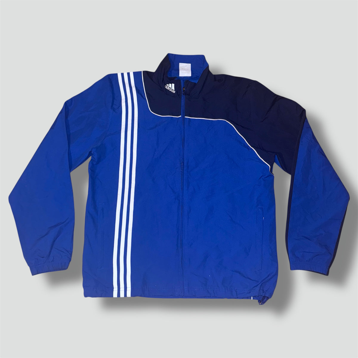 Vintage Adidas black and blue track jacket
