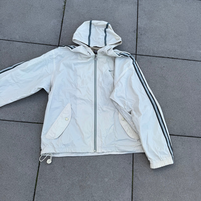 Detailansicht: Sourced limited accessories and clothes Vintage Nike beige rain jacket 90s – Logo, Nähte oder Material